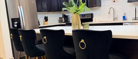Coffee/tea maker, fridge, microwave, oven