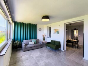 Apartment, Sea View | Living area | Flat-screen TV - Piante Del Principe Apartments and Rooms (Carini)