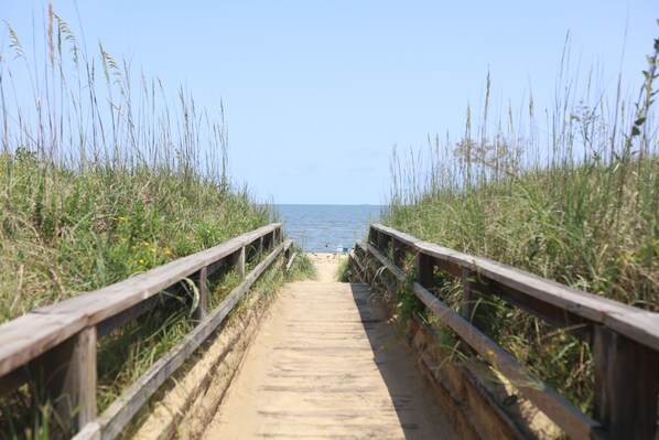 On the beach, sun loungers, beach towels