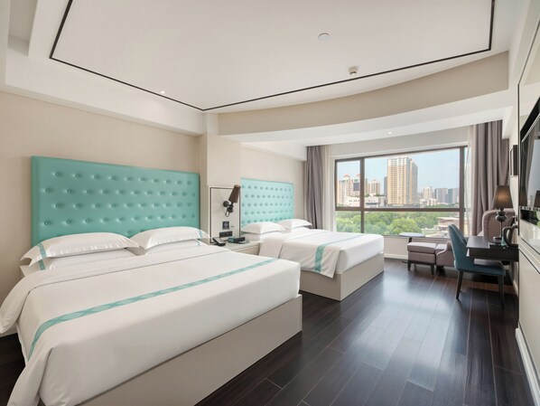 A hotel room with two beds, a desk, and a view of the city. - XANA LITE Hotel Shixi Metro Station (Guangzhou)