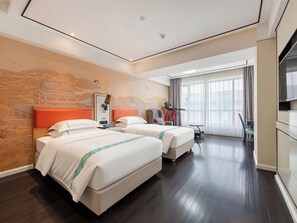 A hotel room with two beds, a treadmill, and a large window with curtains. - XANA LITE Hotel Shixi Metro Station (Guangzhou)