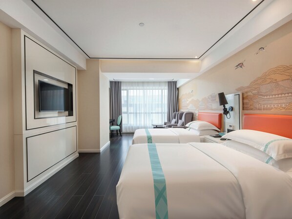 A hotel room with two beds, a TV, a desk, and a view of the cityscape. - XANA LITE Hotel Shixi Metro Station (Guangzhou)