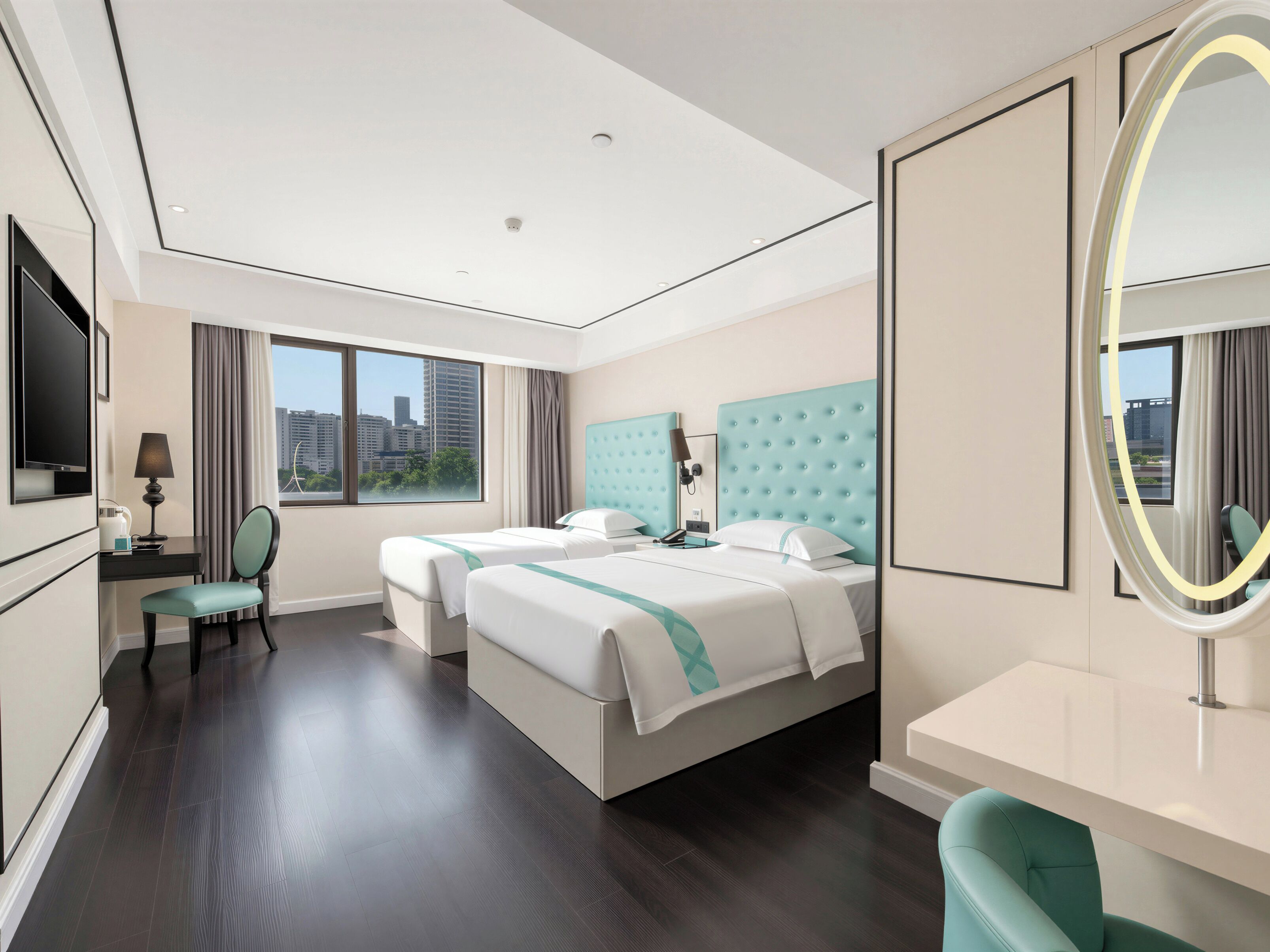 A modern hotel room with a large bed, a desk, a chair, a TV, and a city view.