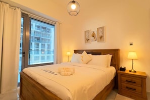 1 habitación, tabla de planchar con plancha, cuna de viaje y wifi