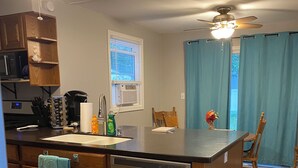 Coffee/tea maker, fridge, microwave, oven