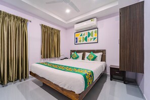 Premium Room | Individually furnished, desk, blackout drapes, iron/ironing board - Treebo Sri vi ka Residency (Puducherry)