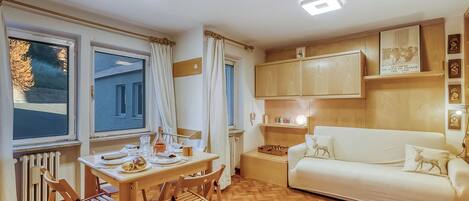 Family Apartment, 1 Bedroom (Appartamento Gran Roc few steps from) | Living area | 21-inch flat-screen TV with digital channels, TV