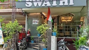 A hotel named "SWATHI" with a contact number 9560217756. - Hotel Swathi  (New Delhi)