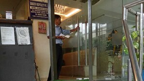 A hotel reception area with a staircase leading to the entrance. - Hotel Swathi  (New Delhi)