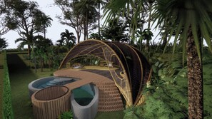 A treehouse with a circular wooden deck, a small pool, and a hammock. - Hideout Mountain by Ini Vie Hospitality (Selat)