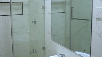 Shower, towels, toilet paper