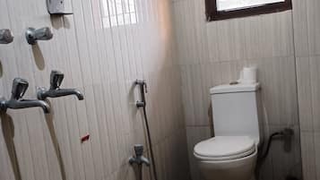 Shower, towels, shampoo, toilet paper
