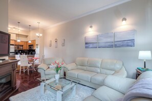 Exclusive Apartment | Living area | 48-inch Smart TV with satellite channels - Rivetstays - The Yonge Grand Suites (Toronto)