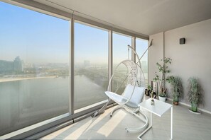 Interior - Cozy Waterfront Stay with Balcony, Kitchen & Smart TV (Al Jaddaf)