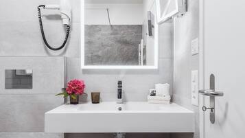 Shower, free toiletries, hair dryer, towels