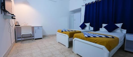 Camera Deluxe con 2 letti singoli, 1 camera da letto, non fumatori, vista città | Biancheria da letto di alta qualità, tende oscuranti, Wi-Fi gratuito