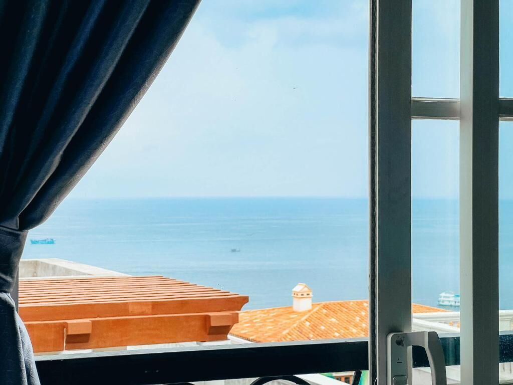 Deluxe Quadruple Room, Balcony, Beach View | Terrace/patio