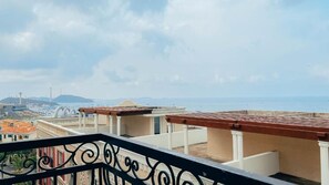 Estúdio luxo, sacada, vista para a praia | Terraço/pátio