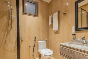 Basic Room | Bathroom | Hair dryer, towels, soap, shampoo - Jazalah al falah serviced apartments  (Riyadh)