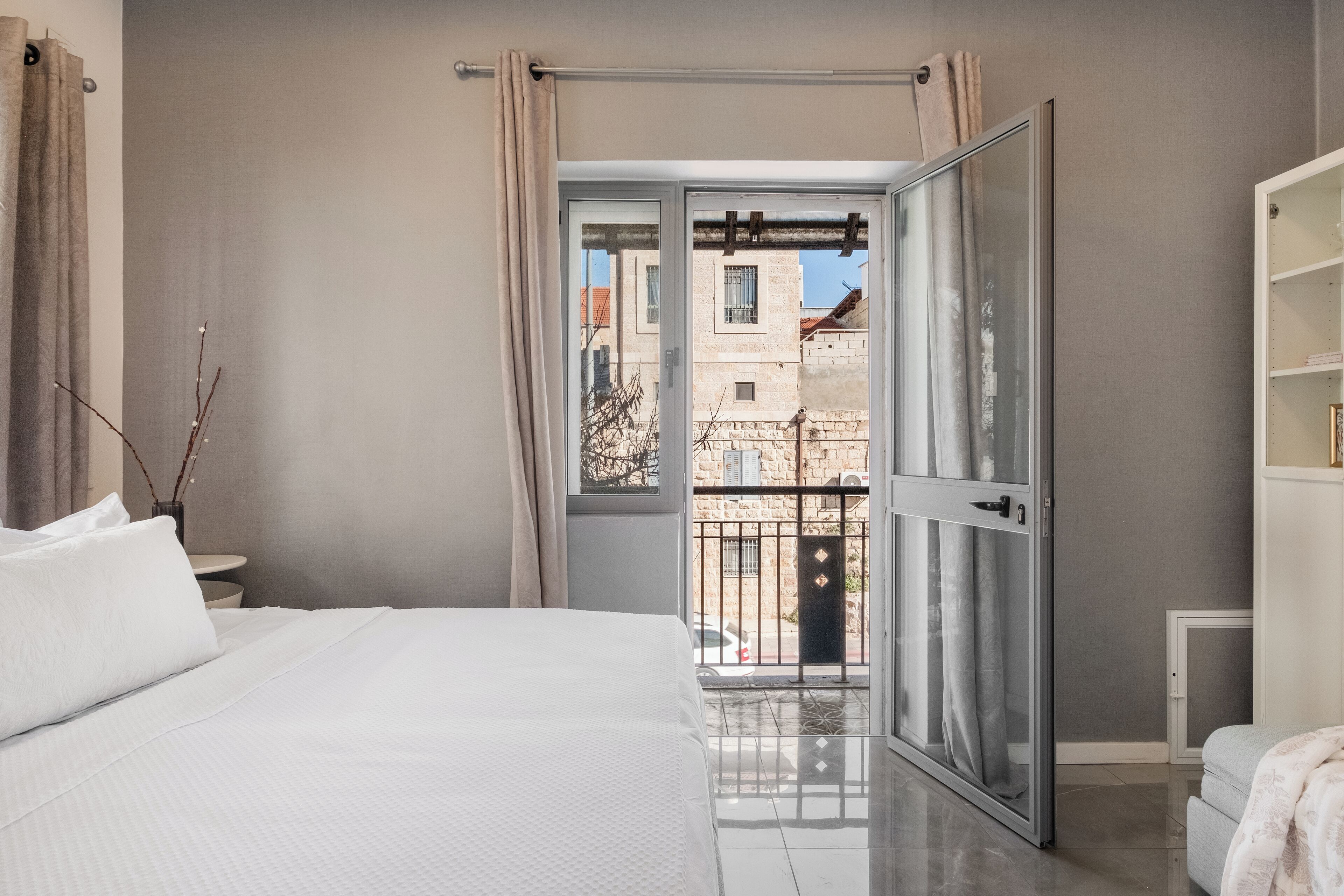 Classic Apartment, Balcony, City View | Desk, laptop workspace, blackout curtains, iron/ironing board