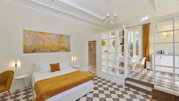 Suite, Garden View | In-room safe, blackout drapes, iron/ironing board, free WiFi