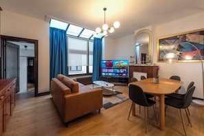 Deluxe Duplex | Living area