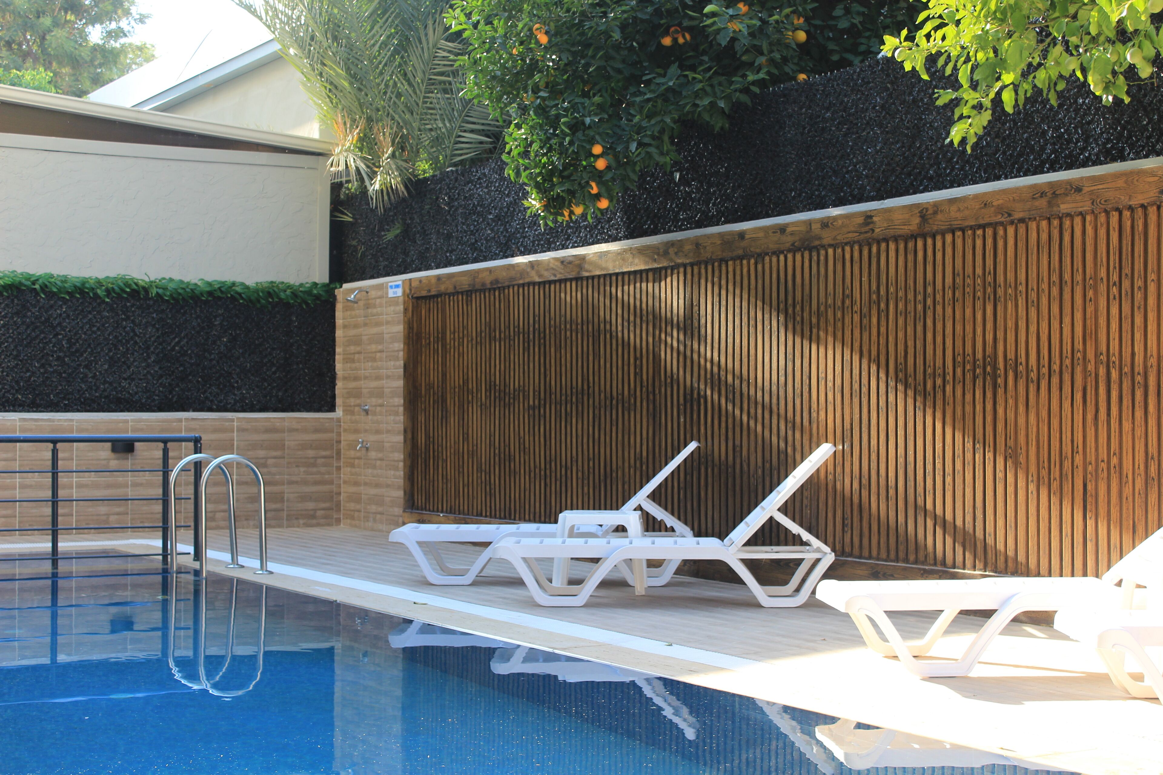 Seasonal outdoor pool, open 9:00 AM to 6:00 PM, free pool cabanas