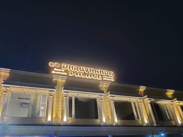 A hotel sign with the name 'DHRUVNANDA PALACE' and a message indicating 'Room Available.' - Hotel Dhruvnanda Palace Khategaon (Khategaon)