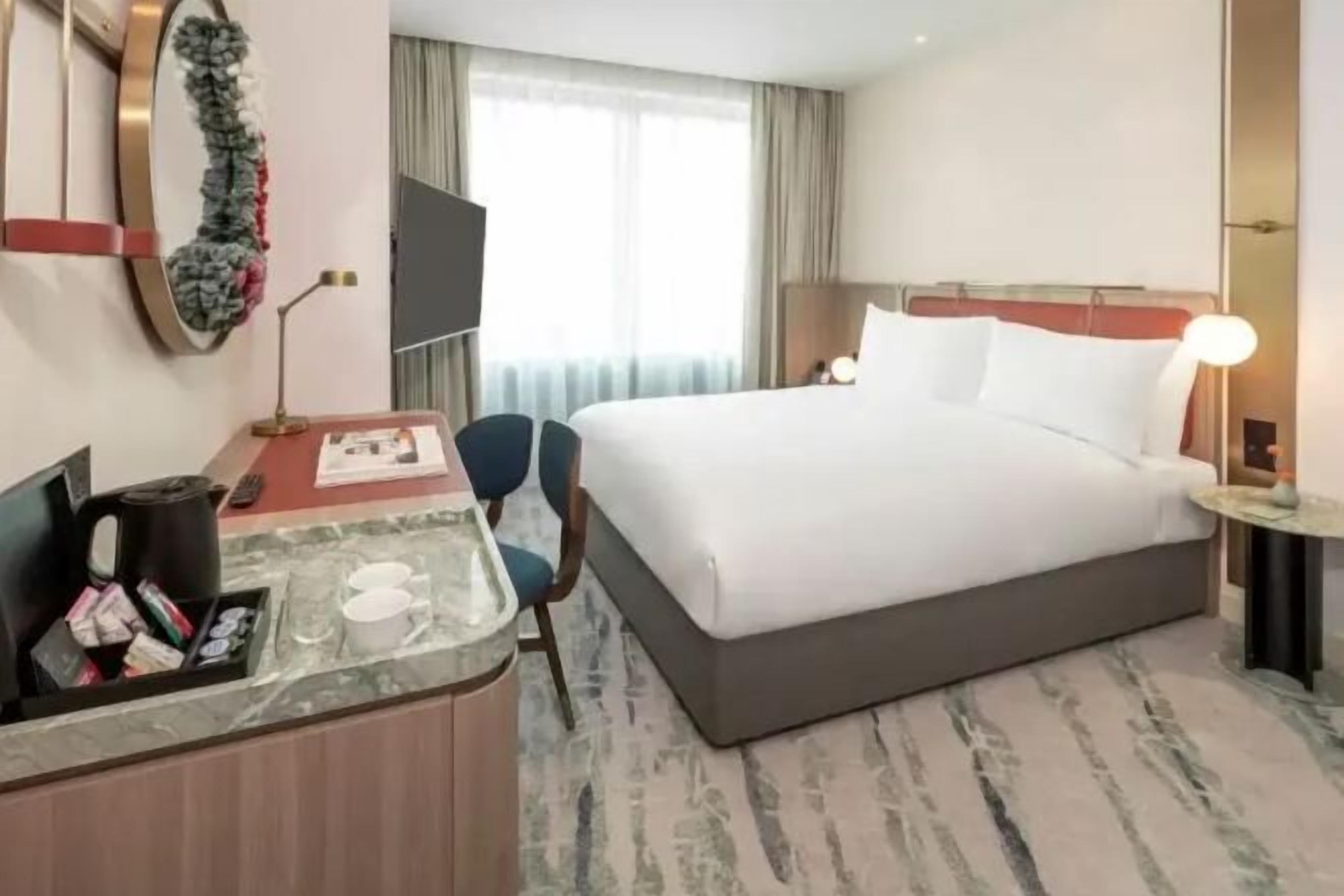 Hypo-allergenic bedding, in-room safe, desk, blackout drapes