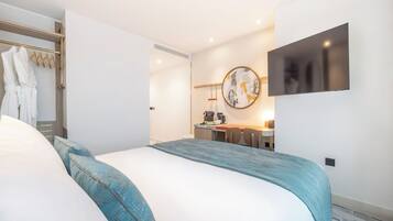 Literie hypoallergénique, coffres-forts dans les chambres, bureau