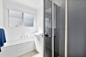 Shower, hair dryer, towels