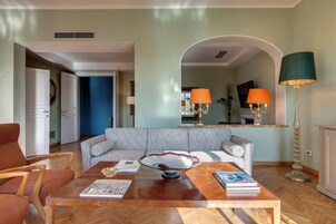 Deluxe Apartment, 4 Bedrooms, Balcony, River View | Living area | 40-inch flat-screen TV with digital channels