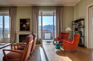 Deluxe Apartment, 4 Bedrooms, Balcony, River View | Living area | 40-inch flat-screen TV with digital channels