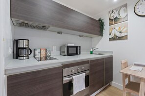Apartment | Private kitchen | Fridge, microwave, oven, stovetop