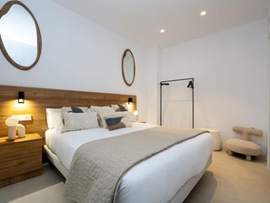 2 عدّة غرف نوم ومكواة/لوح كي وخدمة الإنترنت وملاءات أسرّة