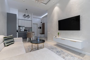 Family Condo, Balcony, City View | Living area
