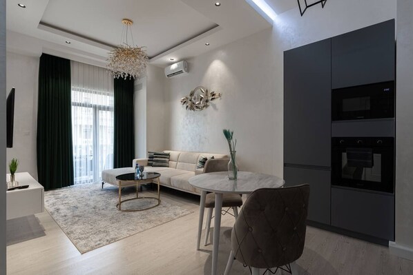 Family Condo, Balcony, City View | Living area