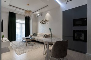 Family Condo, Balcony, City View | Living area - Tashkent city Bulevard Fontaine (Tashkent)