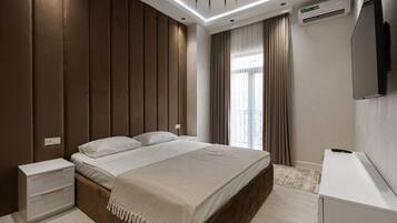 Family Condo, Balcony, City View | 1 bedroom, blackout drapes, iron/ironing board, free WiFi