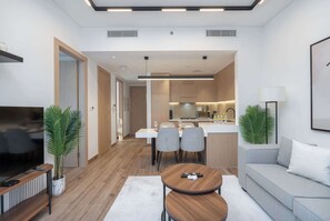 TV - StayShort - Stylish, Minimalist 2-Bedroom in Jumeirah Village Circle (Dubai)