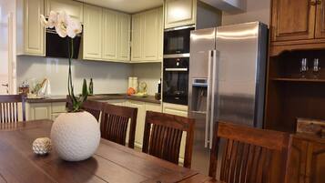 Apartment (One Bedroom Apartment) | Living room | 32-inch flat-screen TV with digital channels