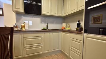 Apartment (One Bedroom Apartment) | Private kitchen | Fridge