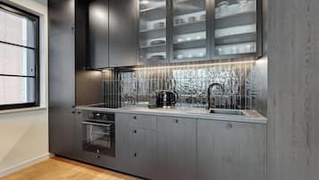 Family Apartment | Private kitchenette | Fridge, coffee/tea maker, electric kettle, high chair