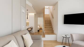 Duplex, City View | Living area | Flat-screen TV