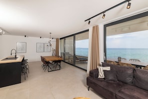 Condo, Balcony, Sea View | Living area | 55-inch LCD TV with satellite channels, Netflix, streaming services - Aqua Blue (Privlaka)