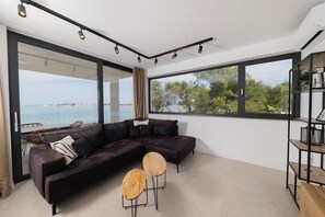 Condo, Balcony, Sea View | Living area | 55-inch LCD TV with satellite channels, Netflix, streaming services - Aqua Blue (Privlaka)