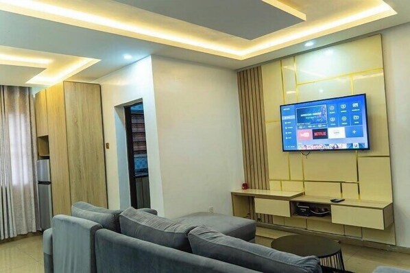 Appartement Économique, balcon, vue ville | Coin séjour