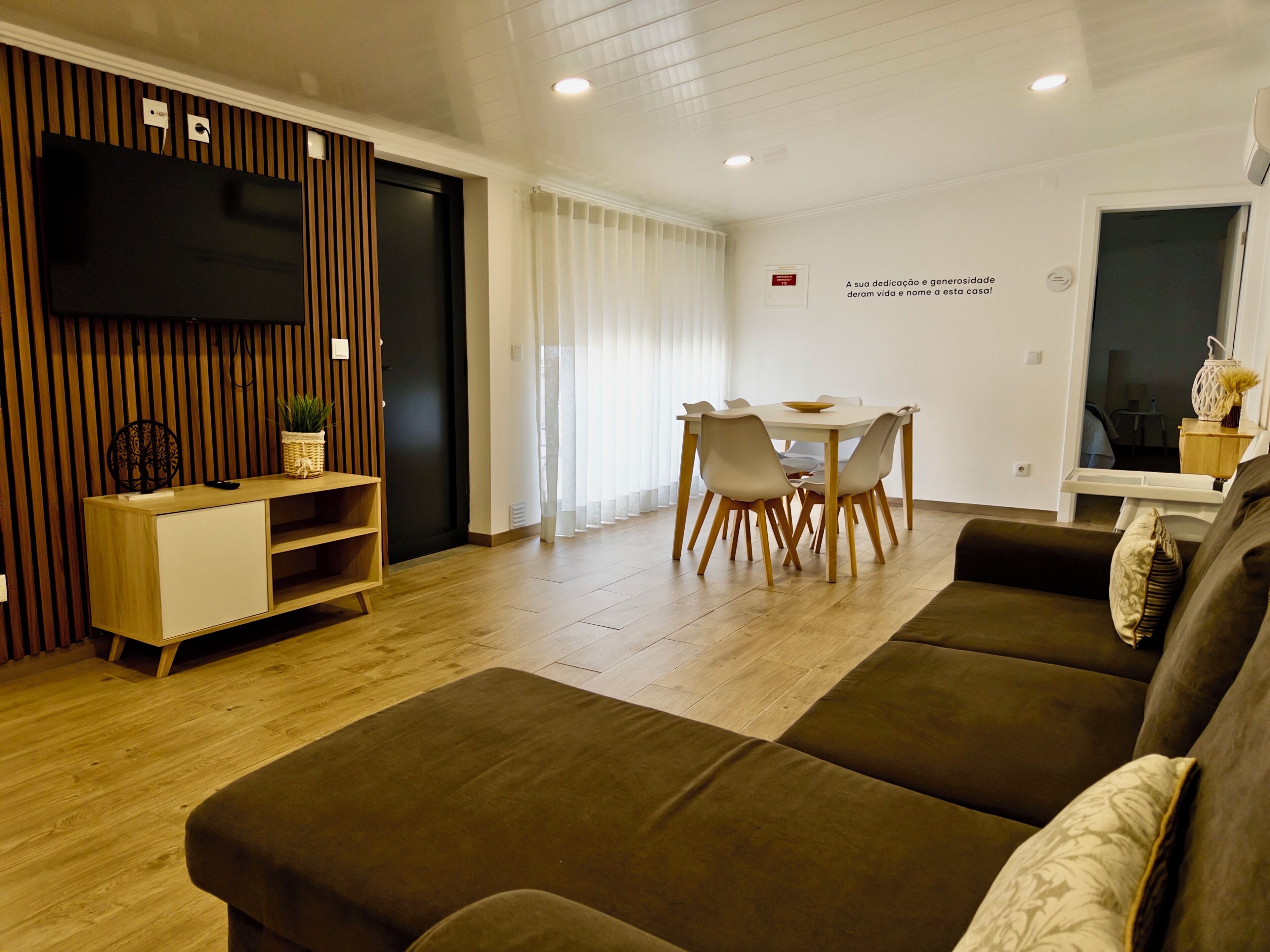 Comfort Townhome | Living area | 90-inch flat-screen TV with cable channels, offices