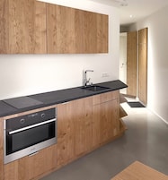 Standard Apartment, Balcony, Garden View | Private kitchen | Fridge, oven, stovetop, cookware/dishes/utensils