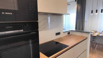 Apartment (Two Bedroom Apartment) | Private kitchen | Fridge